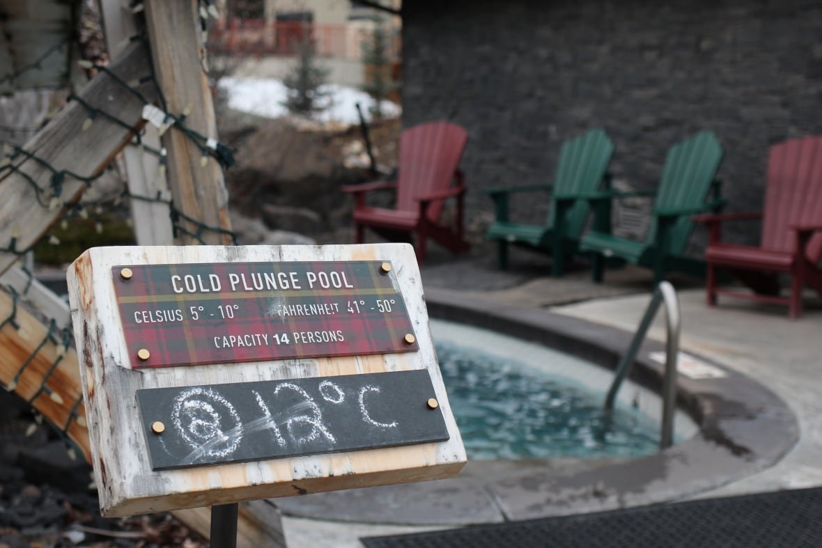 cold-plunge A sign indicating the 12 C temperature of a cold plunge pool is pictured at the Kananaskis Nordic Spa in Alberta.