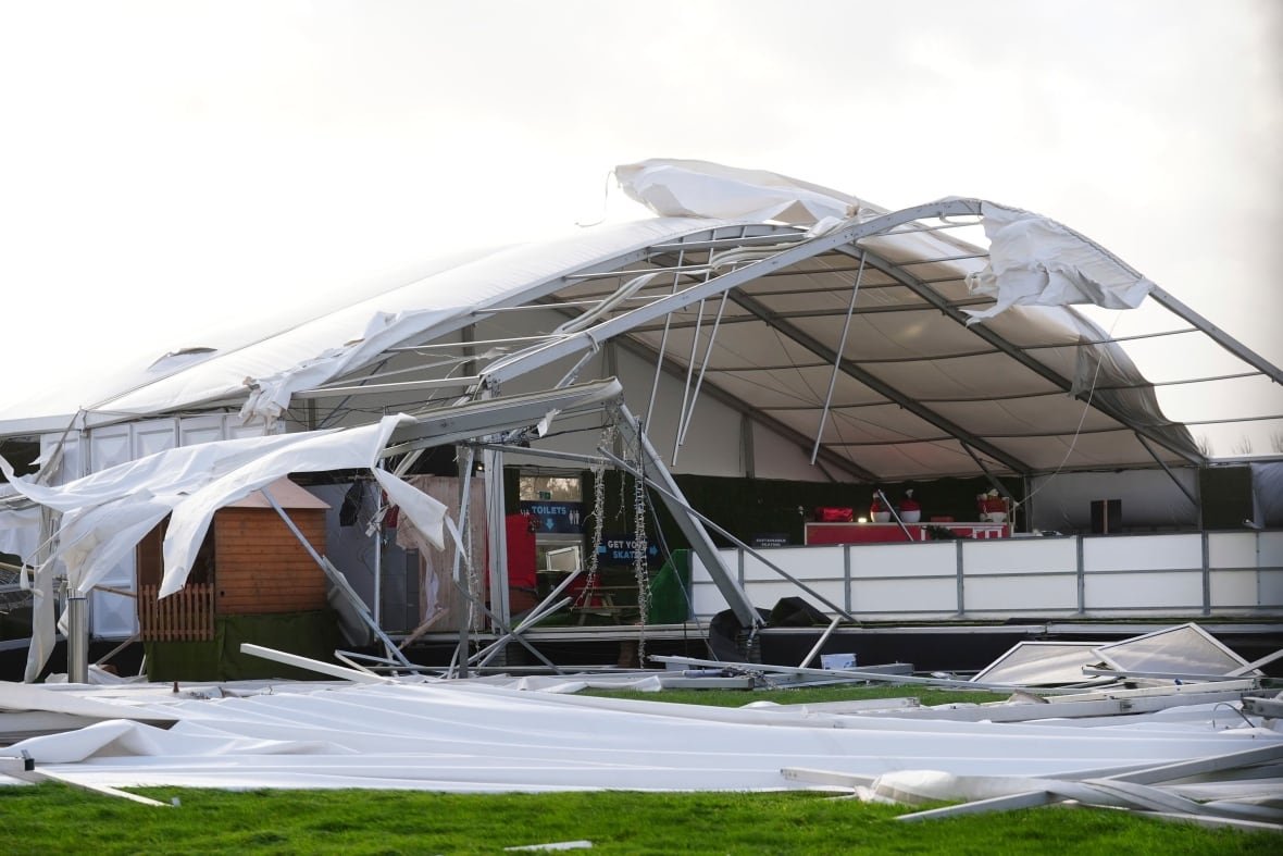 ireland-storm The exterior of a structure is shown with extensive damage to its roof.