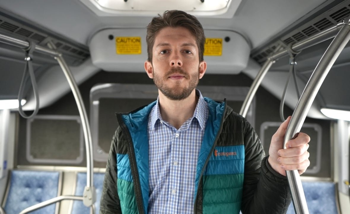 andy-merkley-seattle-department-of-transportation Man standing on a bus.