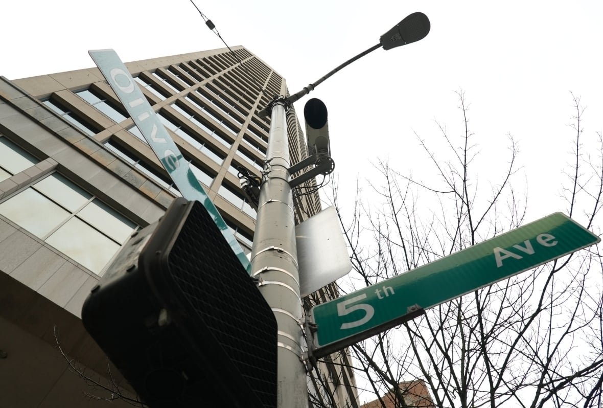 automated-enforcement-camera-in-seattle Automated enforcement camera mounted on a pole at an intersection.