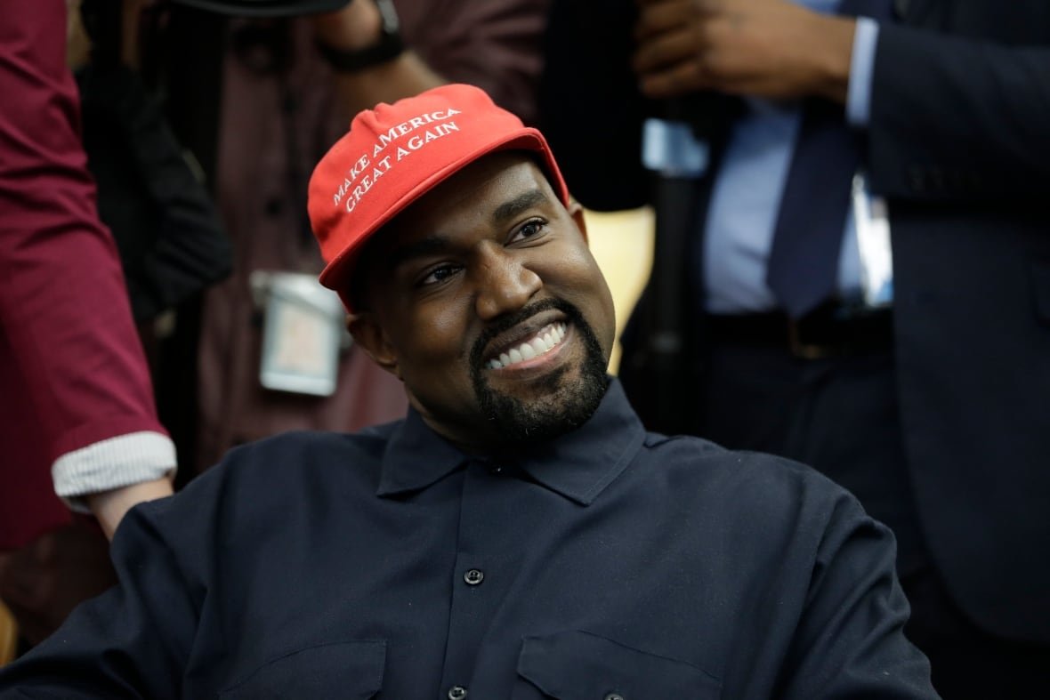 people-kanye-west Rapper Kanye West wears a Make America Great again hat during a meeting with President Donald Trump in the Oval Office of the White House on Oct. 11, 2018. West issued a cryptic answer by text to a reporter about his electoral ambitions, but Democrats see Republican influence behind the scenes.