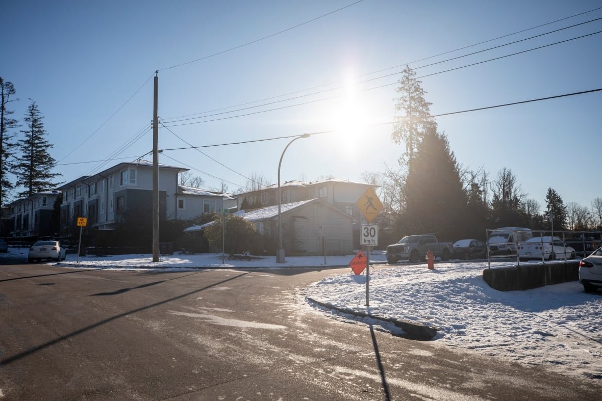 rcmp-iio-ihit-surrey-1 A snowy residential intersection.