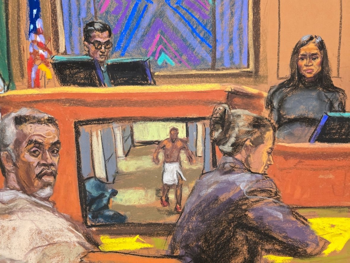cassie-sean-diddy-combs-trial-court-sketch-may-14 A courtroom sketch of a man with grey hair and beard sitting in front of a TV screen that shows a video of the same man walking in a hotel hallway wearing only a white towel. Beside him is a woman in a purple suit, sitting with her back turned. In the background, a woman in a black outfit sits on a court witness stand next to a male judge sitting behind the court bench.