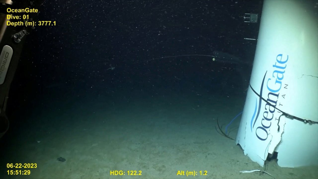 Destroyed vessel with Ocean Gate inscription underwater